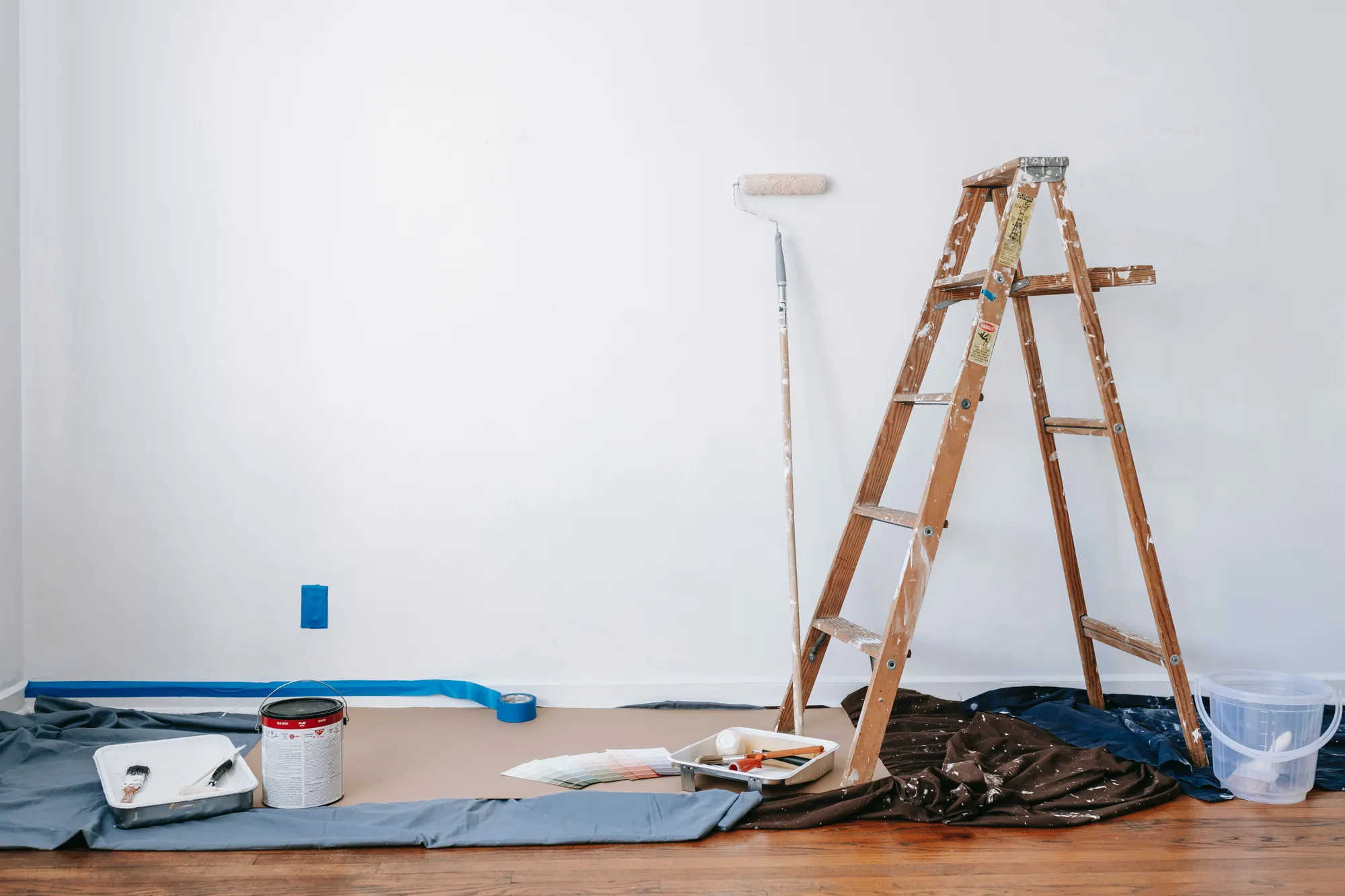 Contractor prepping a room for paint